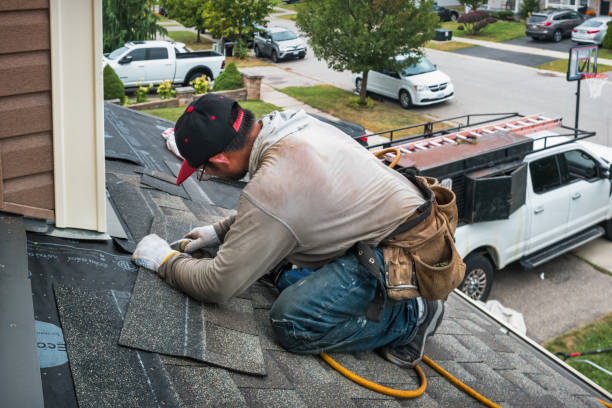 Professional Gutter Installation technician working in Puyallup, WA